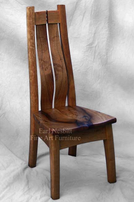 custom made mesquite and cherry dining chair front view showing sculpted seat